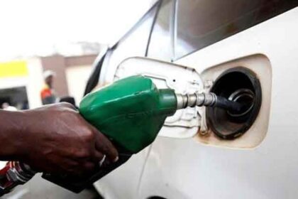 Motorists filling up petrol at a gas station, highlighting the impact of rising fuel prices on private transportation in Pakistan.