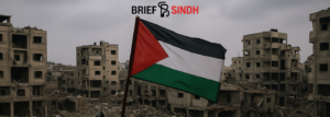 A war-torn street in Gaza showing destroyed buildings, rubble, and smoke, symbolizing the ongoing conflict and humanitarian crisis in the region